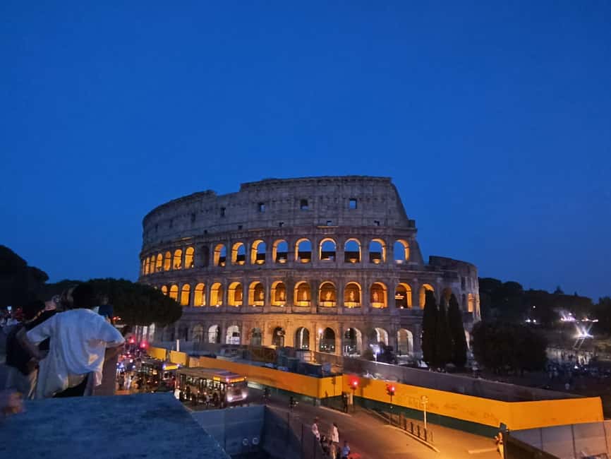 Rome: Private Night Golf Cart Tour - The Colosseum begins the Roman night ride