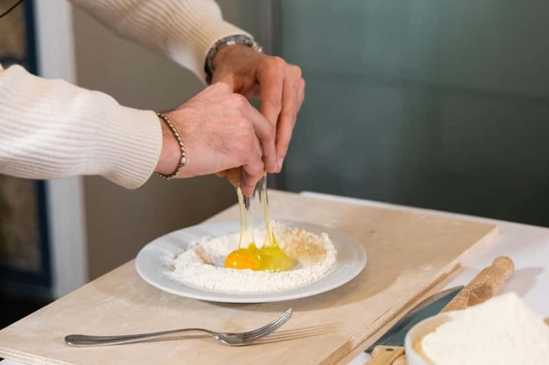 Rome: Ravioli, Fettuccine and Tiramisu Cooking Class - Shaping ricotta ravioli with butter and sage