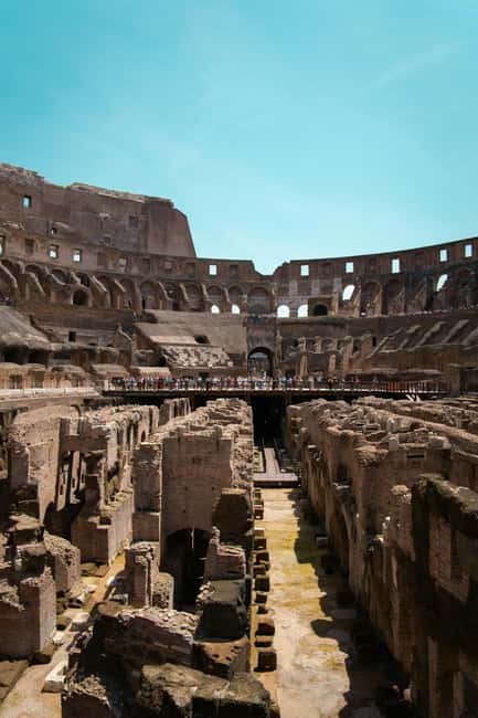 Rome: Small-Group Colosseum, Roman Forum & Palatine Hill - Walking through the Roman Forum’s political center