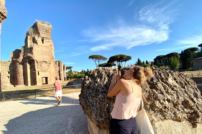 Rome: Small-Group Tour of Caracalla Baths and Circus Maximus - Walking through the grand rooms