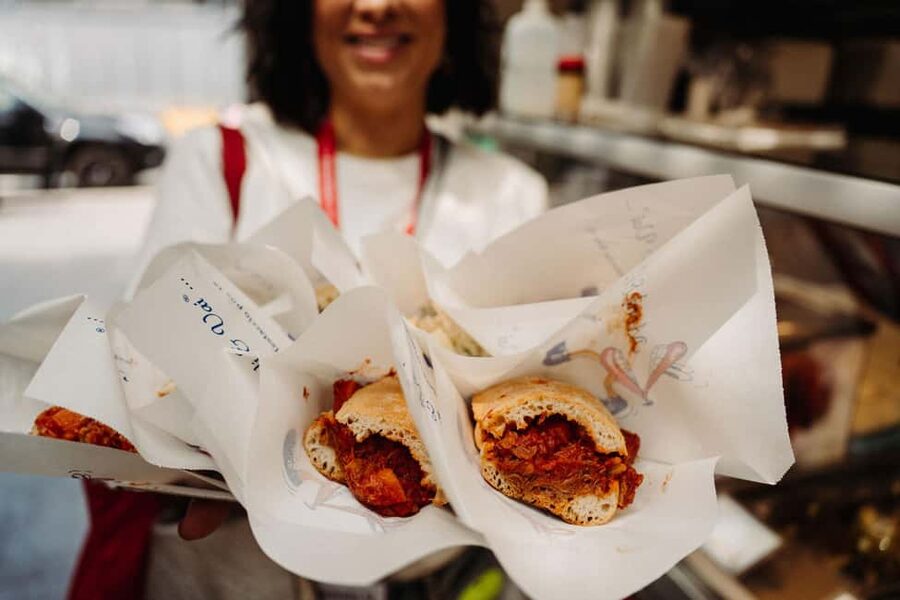 Rome: Testaccio Food & Market Tour with Pasta & Wine - Sitting down for pasta and wine