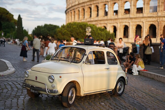 Rome: Vintage Fiat 500 Car Tour with Photographer - The Colosseum photo stop starts the story