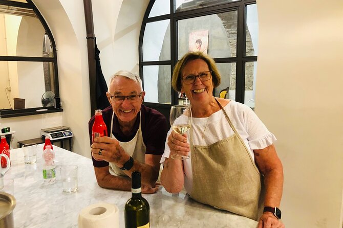 Super Fun Pasta & Gelato Class by Vatican with Wine + Oil Tasting - Making pasta with your hands and a rolling pin