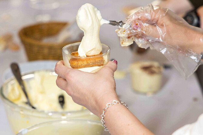 Top Class of Ravioli, Fettuccine and Tiramisu Workshop in Rome - Rolling pasta dough in central Rome
