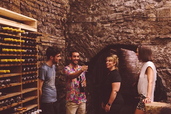 Winner 2025 Rome Twilight Trastevere Food Tour by Eating Europe - Spirito di Vino beneath layers of Rome